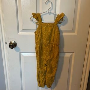 Yellow jumpsuit with ruffle straps and button back